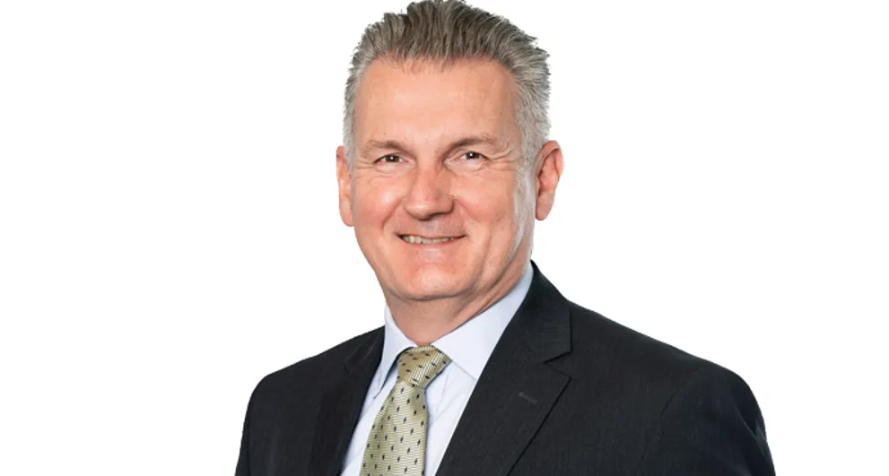 Stephen land wearing a suit