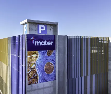 Mater Health Multi Storey Carpark Townsville Aerial View Of Top With Parking Signage Mater Logo And Indigenous Artwork on Multi-level Carpark